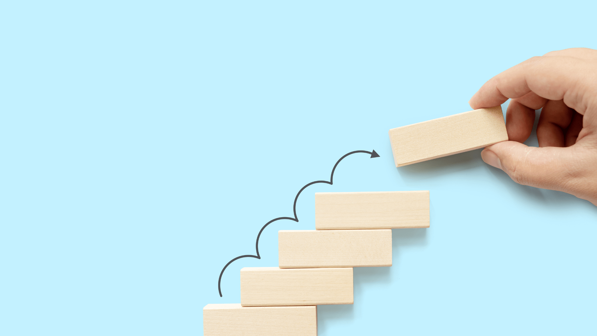 representation of taking a career step upward with blocks for a career transition