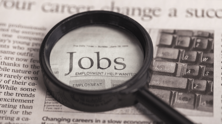 Traditional job search of looking in the newspaper instead of using outplacement services australia