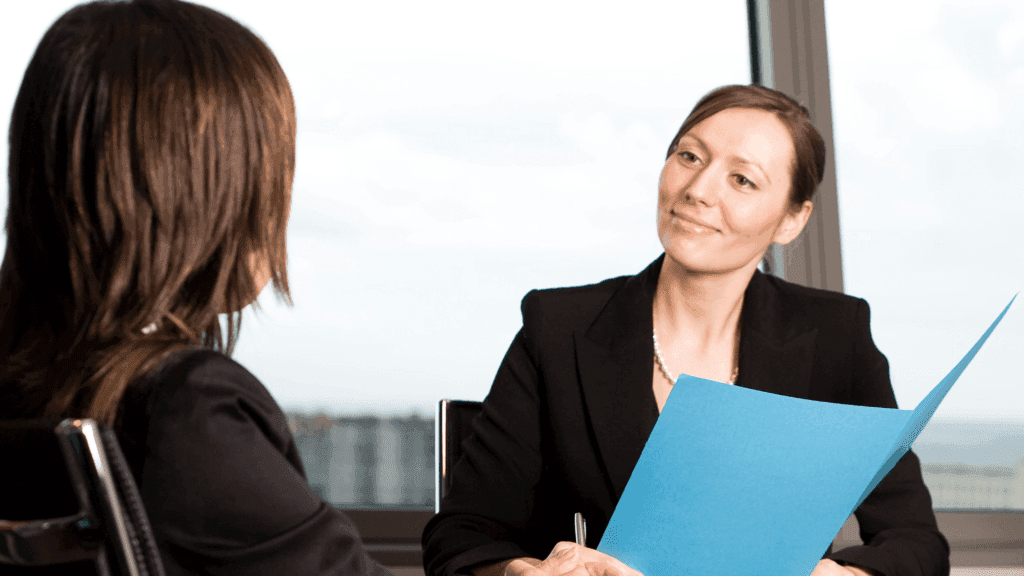 Person being made redundant and manager offering outplacement services Australia